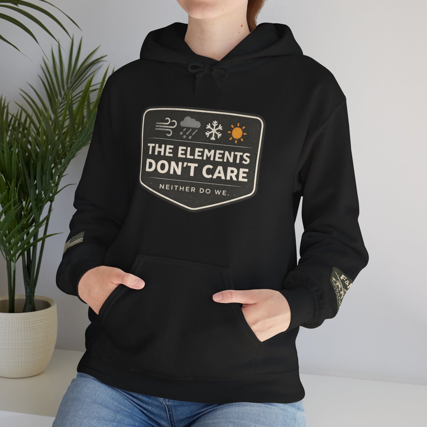 The Elements Don't Care Unisex Heavy Blend™ Hooded Sweatshirt