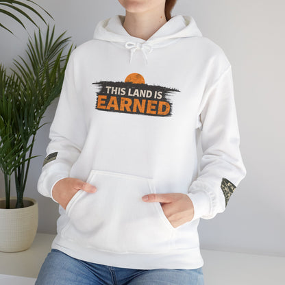 The Land Is Earned Unisex Heavy Blend™ Hooded Sweatshirt